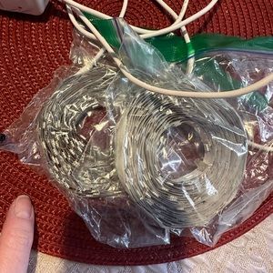 2 rolls of LED lights never used.  All chords included